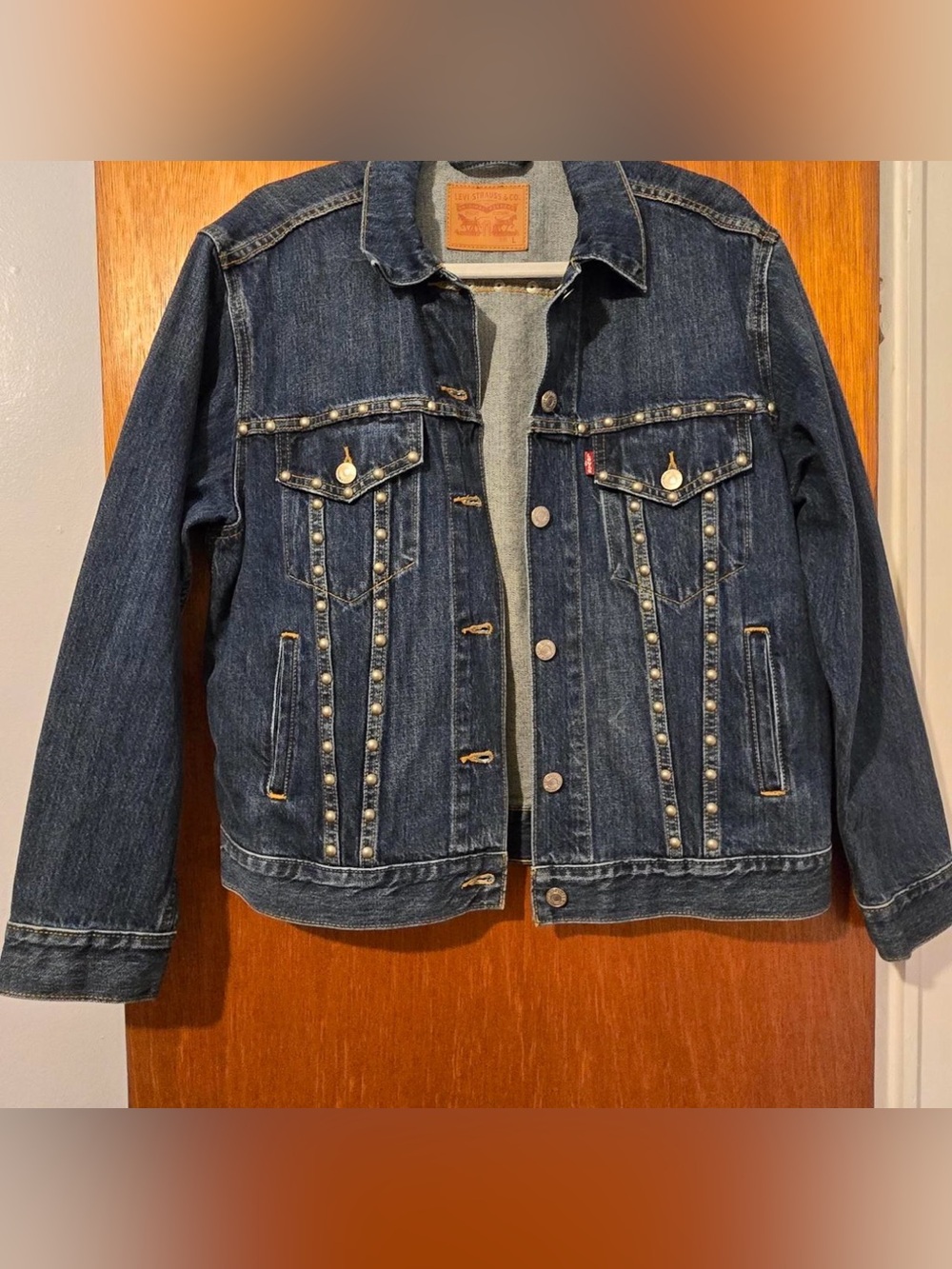 Levi’s dark denim jacket with stud details